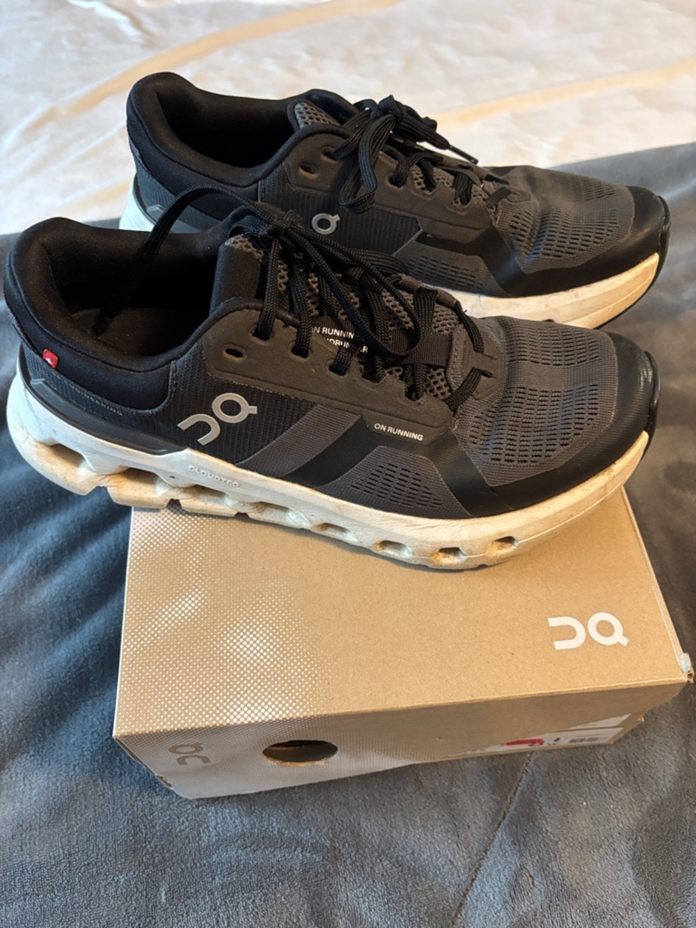 On Running Black and White Women's Cloudsurfer Sneakers